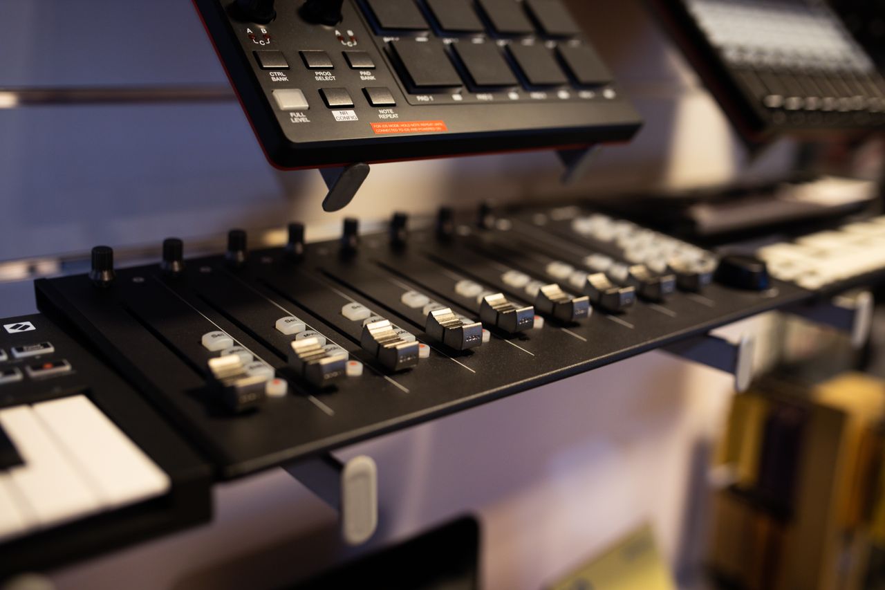 Audio engineer at a mixing console